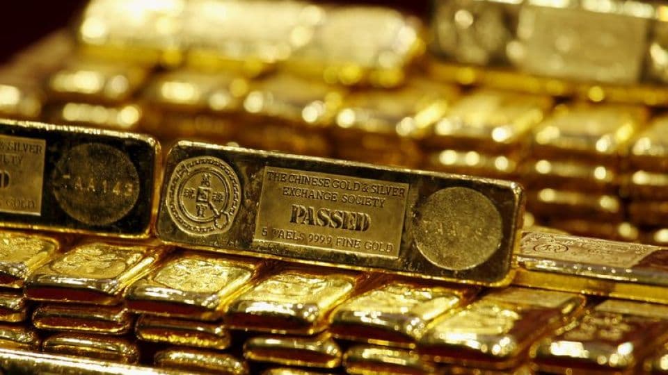Çin Merkez Bankası'nın altın alımını gösteren, üzerinde "THE CHINESE GOLD & SILVER EXCHANGE SOCIETY" yazan altın külçeleri.