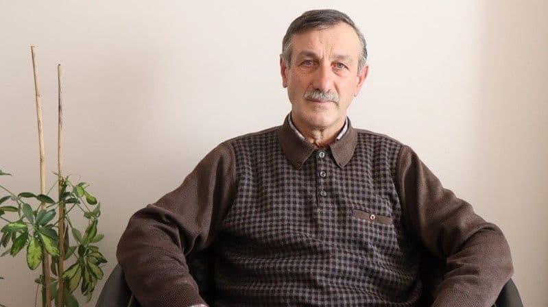 Gümüşhane'de ruhsatlı silah kazasında hayatını kaybeden esnaf Vural Öz'ün portre fotoğrafı.