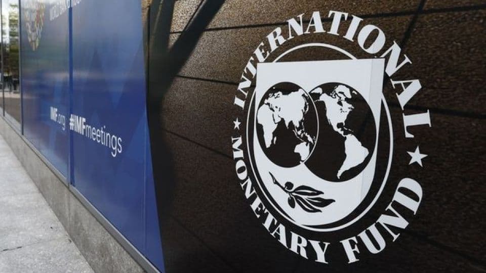Uluslararası Para Fonu (IMF) logosu ve binası.